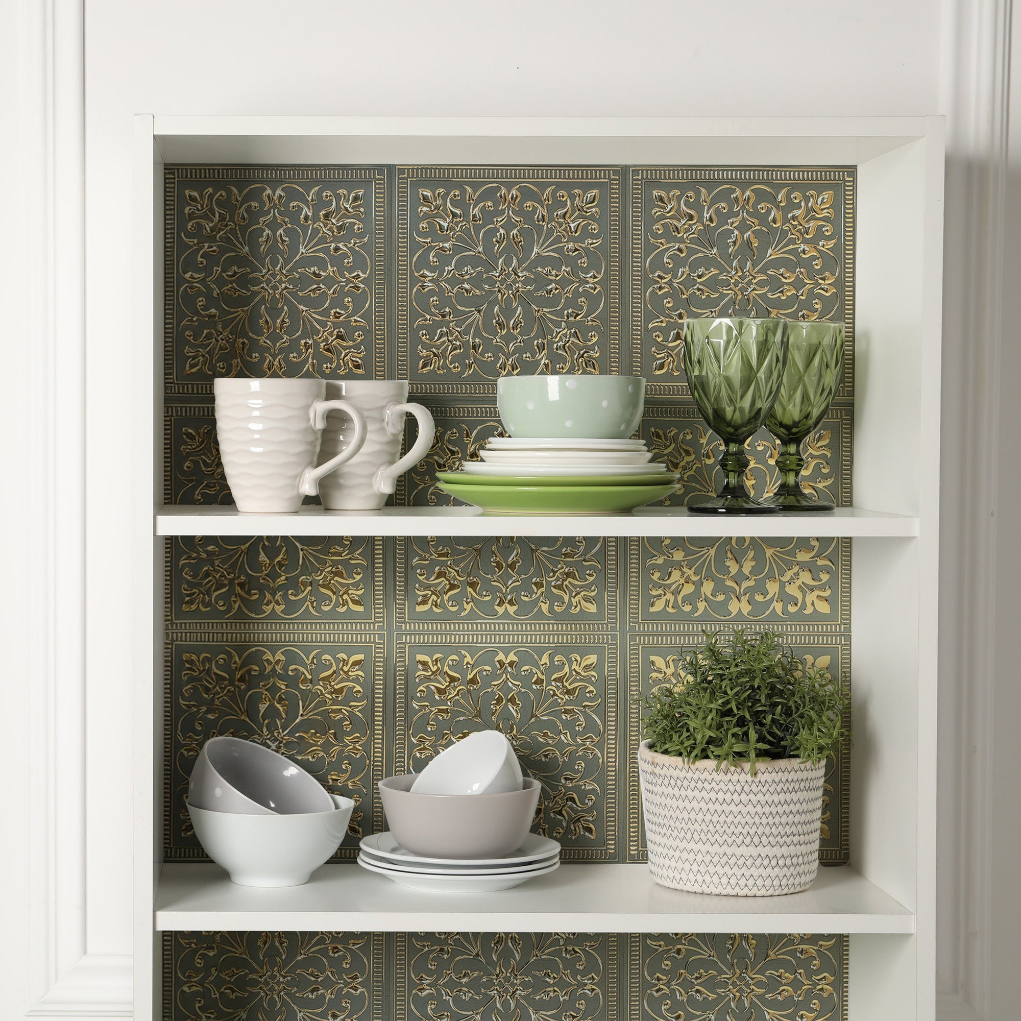 Rustic Farmhouse peel and stick metal tiles installed as a decorative backing inside a white shelf hutch